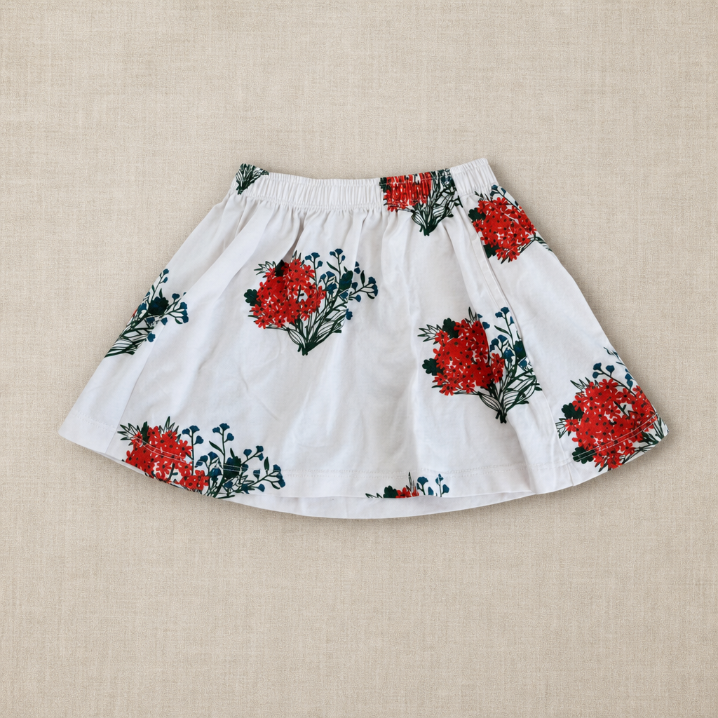Falda Tinycottons blanca con flores rojas