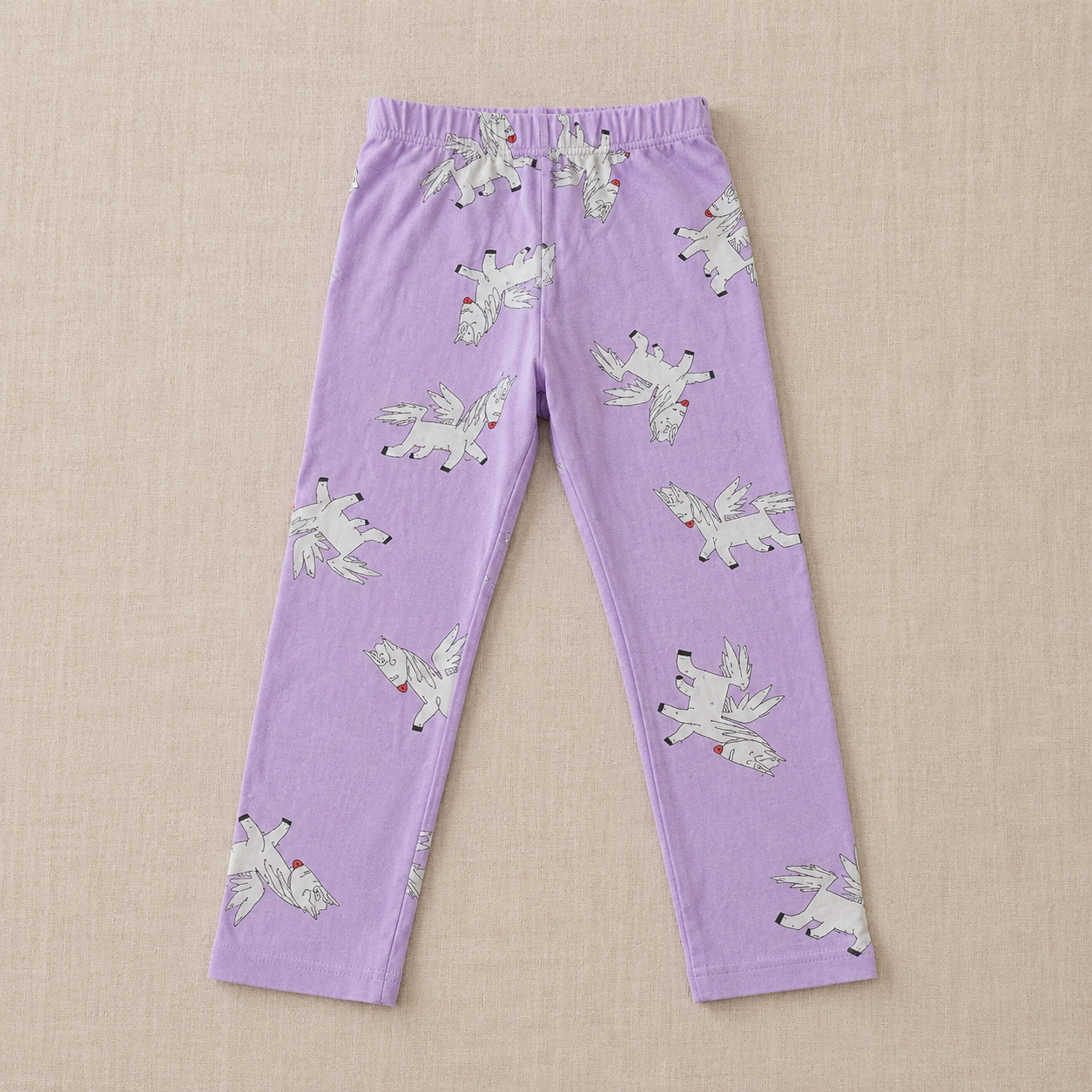Leggings Lötiekids lila con unicornios alados