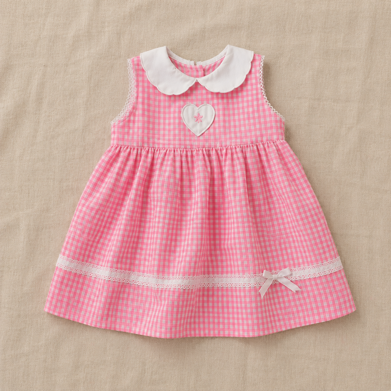 Vestido corto vichy rosa/blanco con corazón bordado
