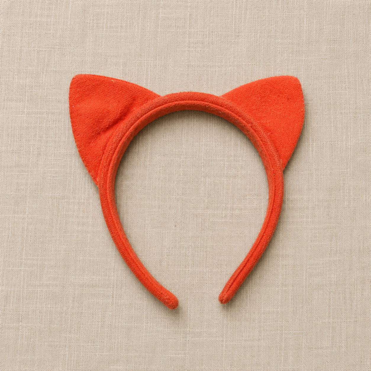 Diadema infantil Dikkie Dik con orejas de gato naranja