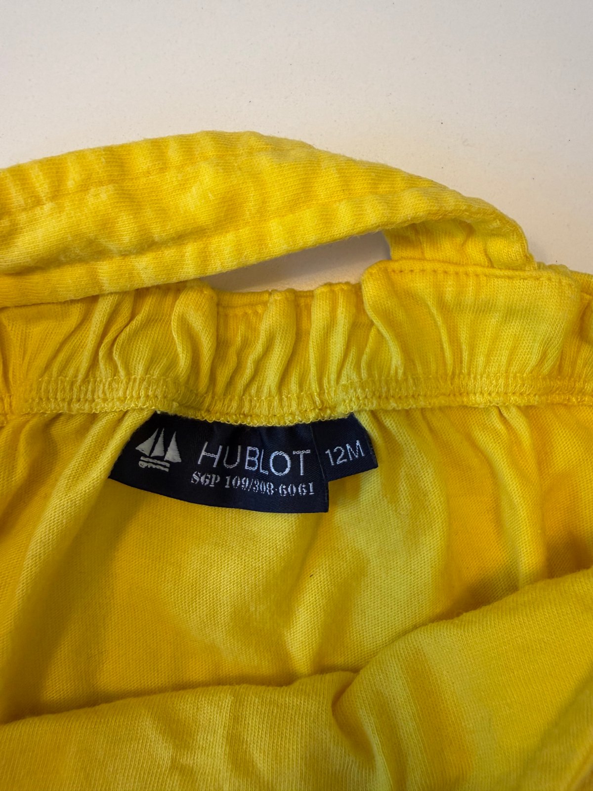Peto amarillo vintage Hublot